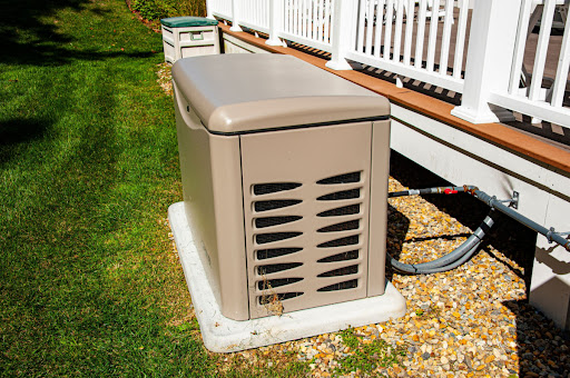 A standby generator installed outside a home.